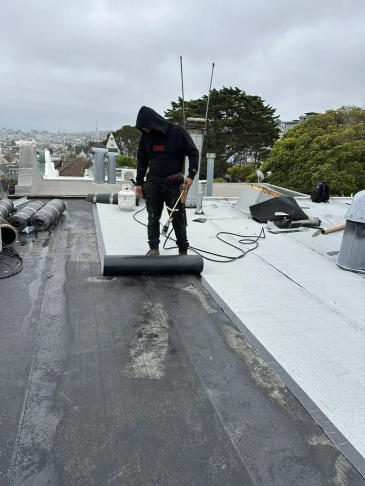 Slide of Rene’s Roofing