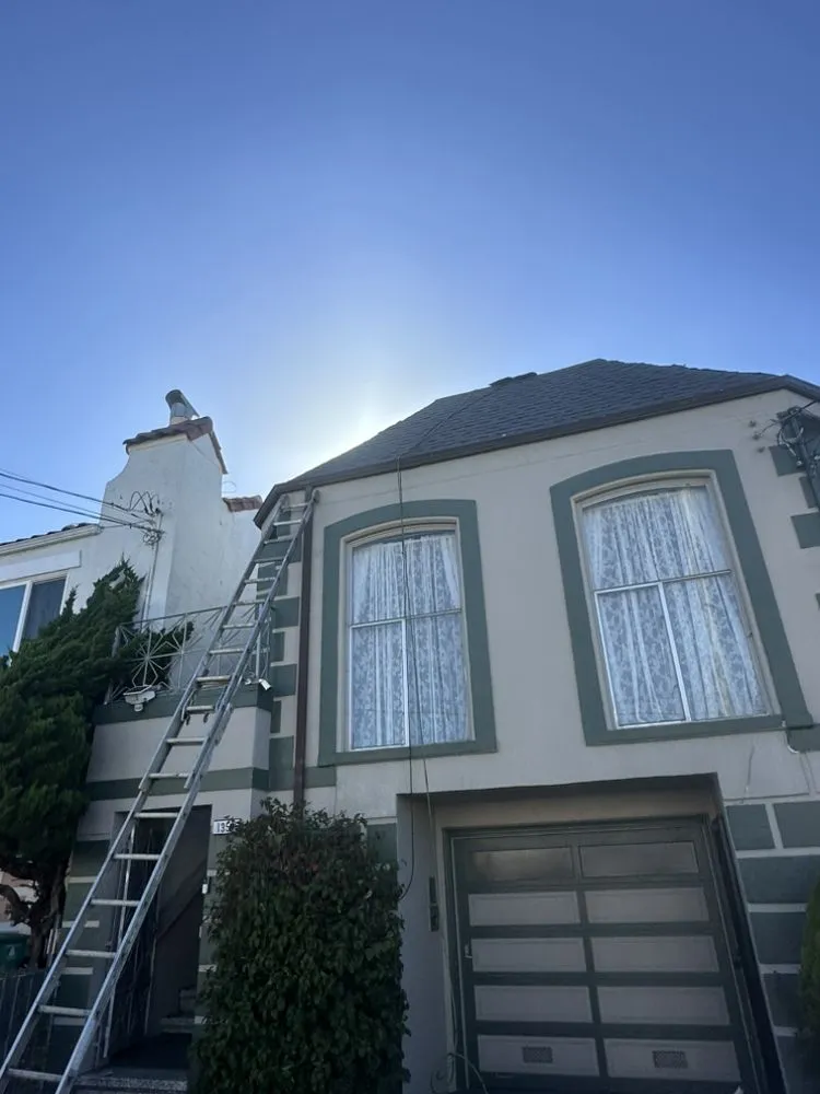 Slide of Rene’s Roofing