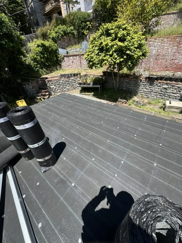 Slide of Rene’s Roofing