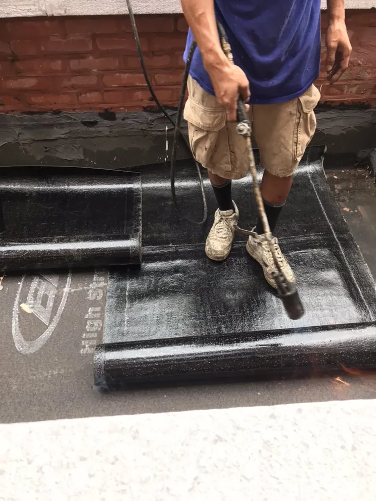 Slide of Renew Roofing