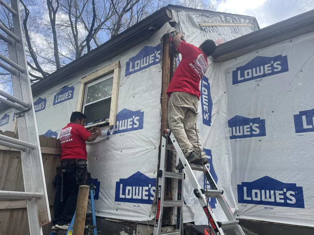 Licensed flat roof repair for residential properties in Clayton, IN by Renewed Restoration