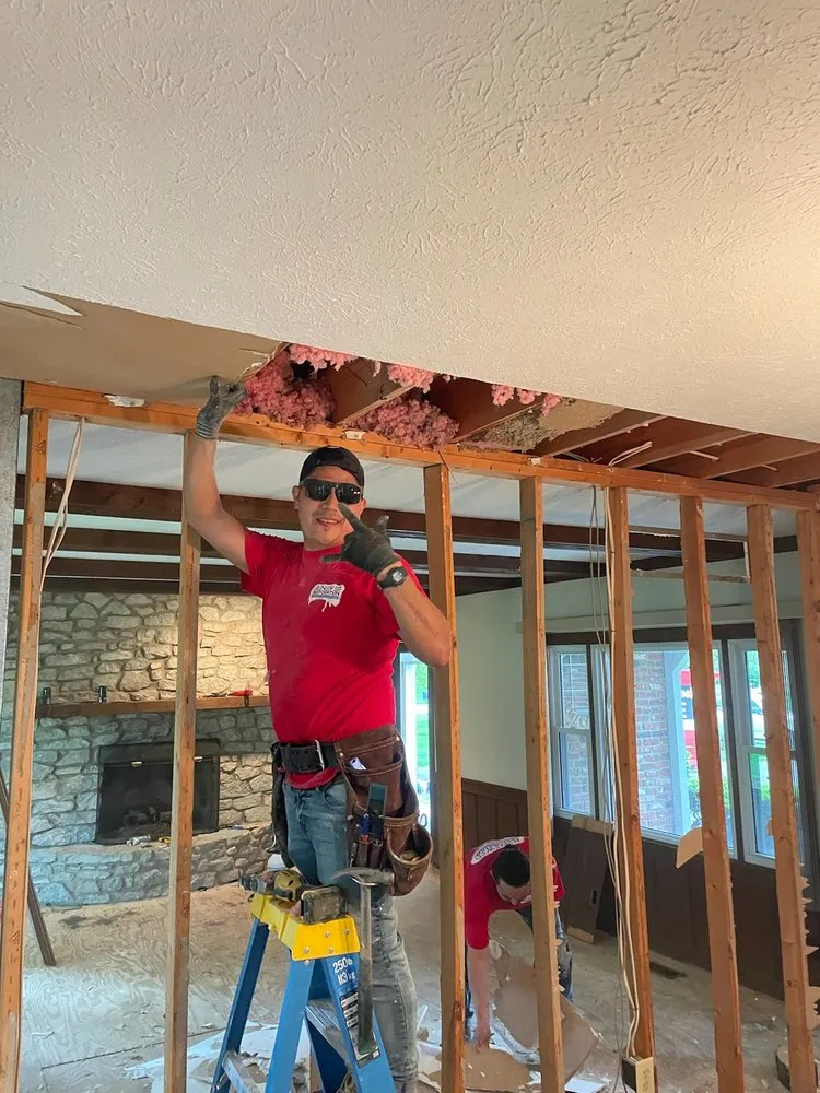 Licensed storm damage roof repair in Clayton, IN by Renewed Restoration