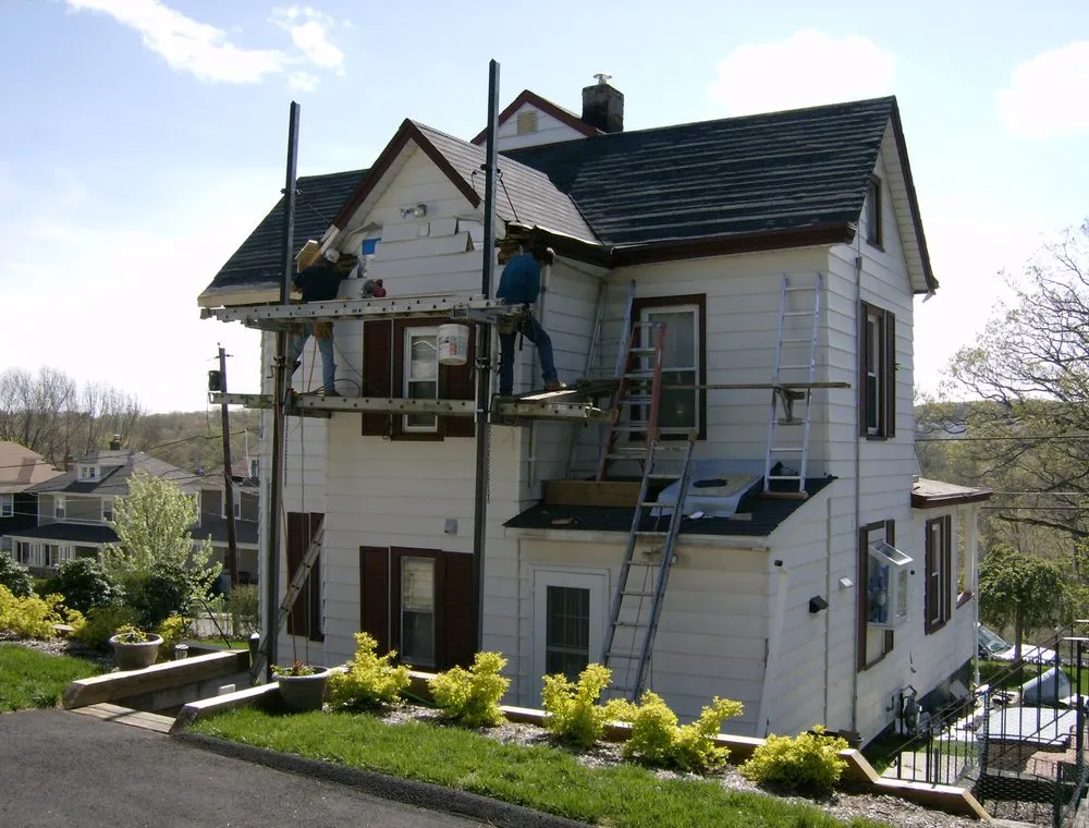 Slide of Renken Roofing & Construction Corp