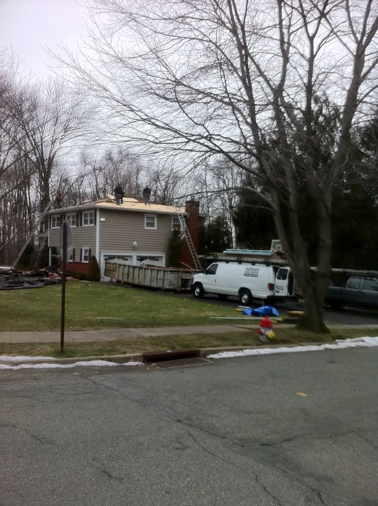 Slide of Renken Roofing & Construction Corp