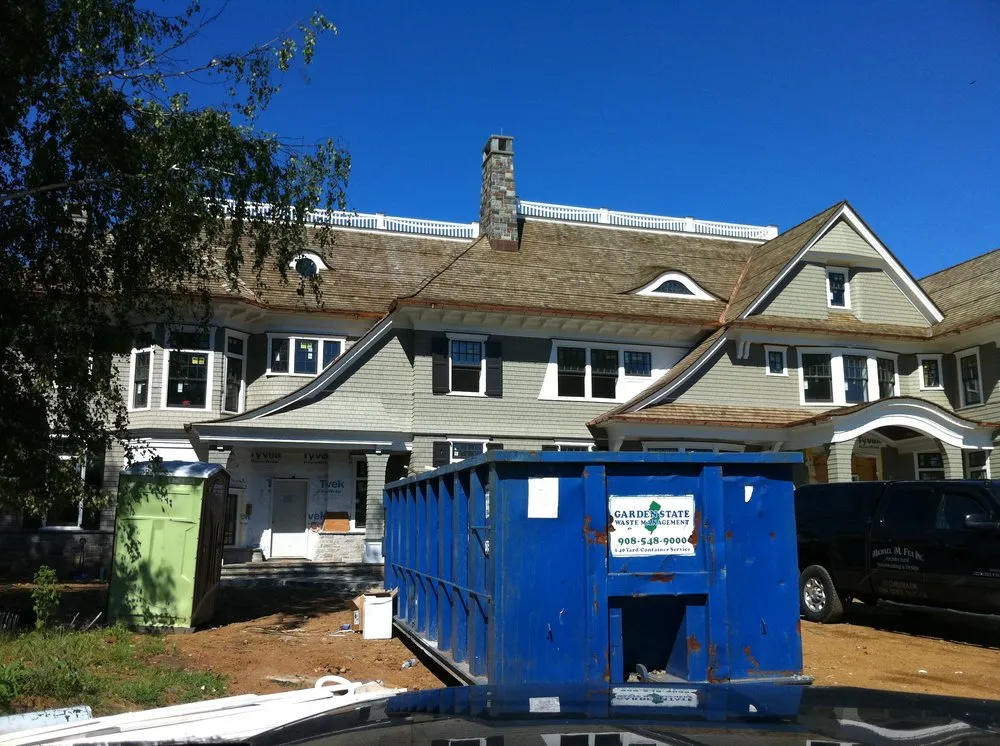 Slide of Renken Roofing & Construction Corp