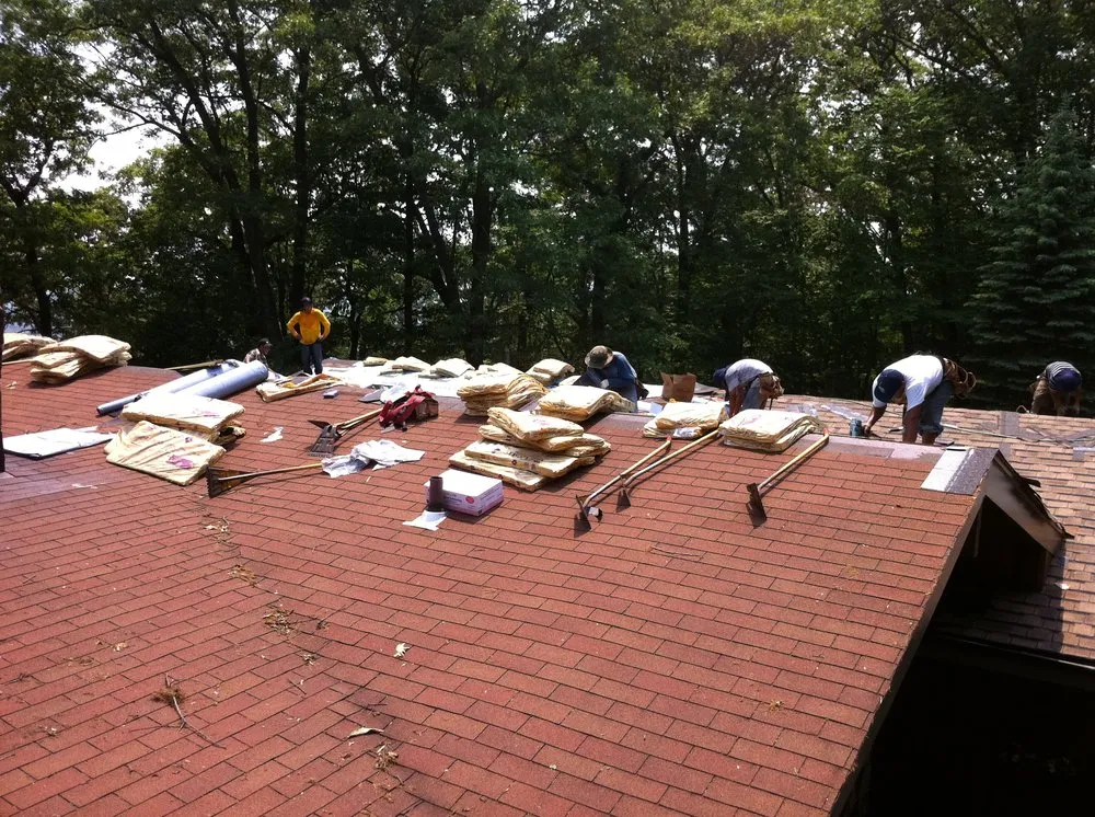 Slide of Renken Roofing & Construction Corp