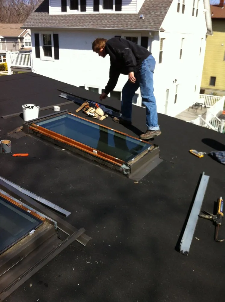 Slide of Renken Roofing