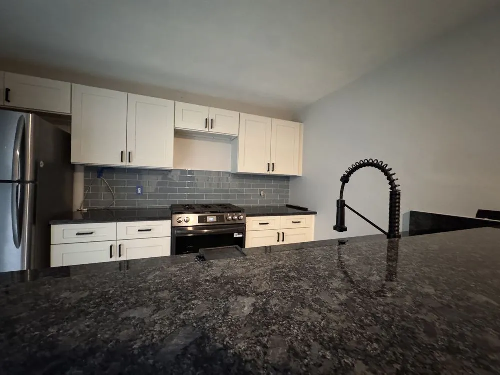 Slide of Renomax Contracting