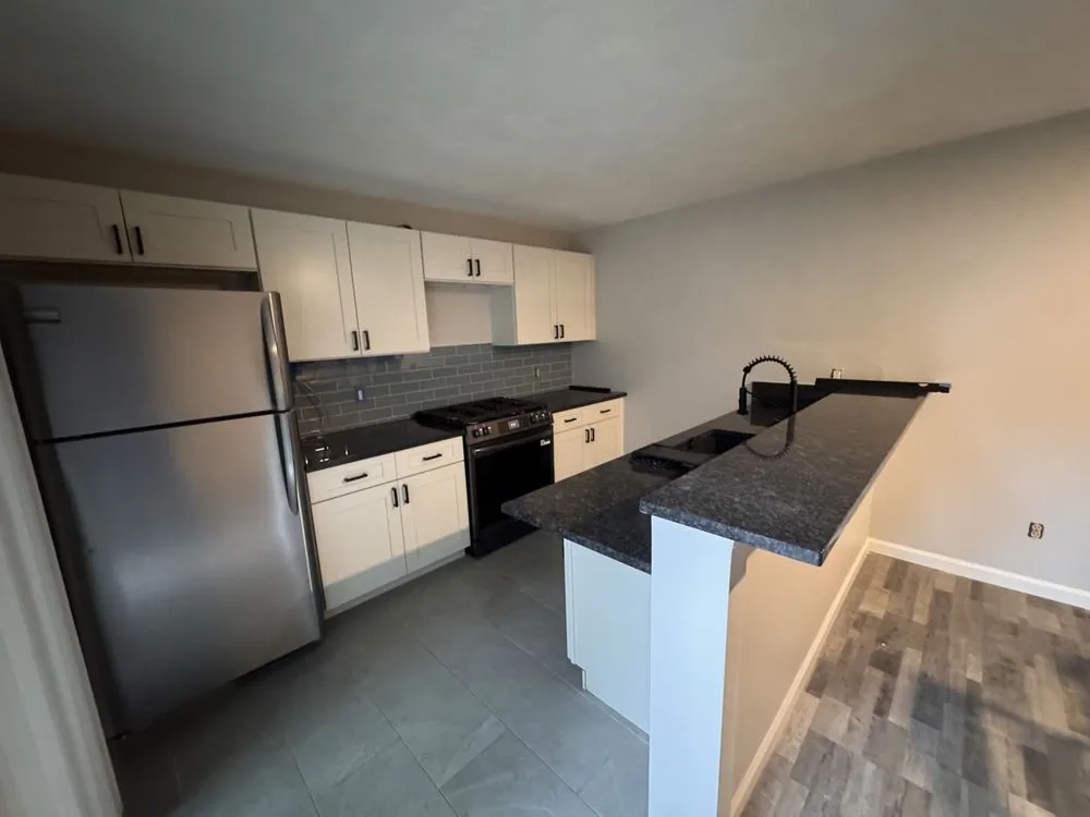 Slide of Renomax Contracting