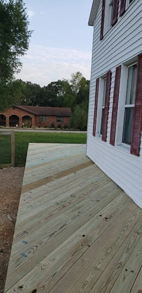 Licensed residential roofing service after storm damage in St Louis, MO by Renovate Rite