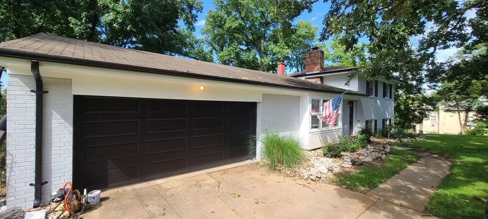 Licensed storm damage roof repair in St Louis, MO by Renovate Rite