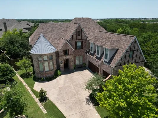 Renovate Roofing and Construction Logo