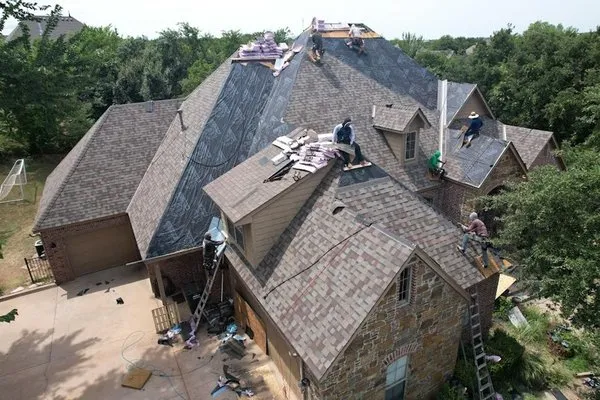 Rescom Roofing & Construction Logo