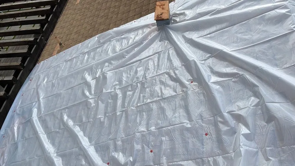 Slide of Rescue Roofing Construction