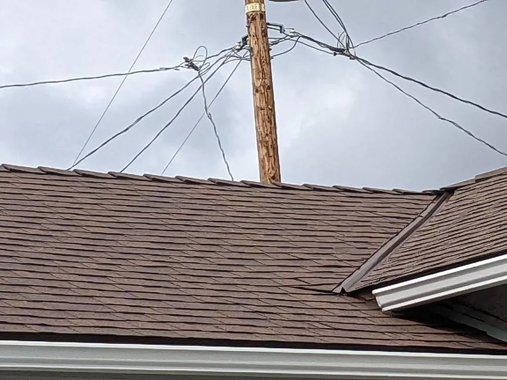 Slide of Rescue Roofing Construction