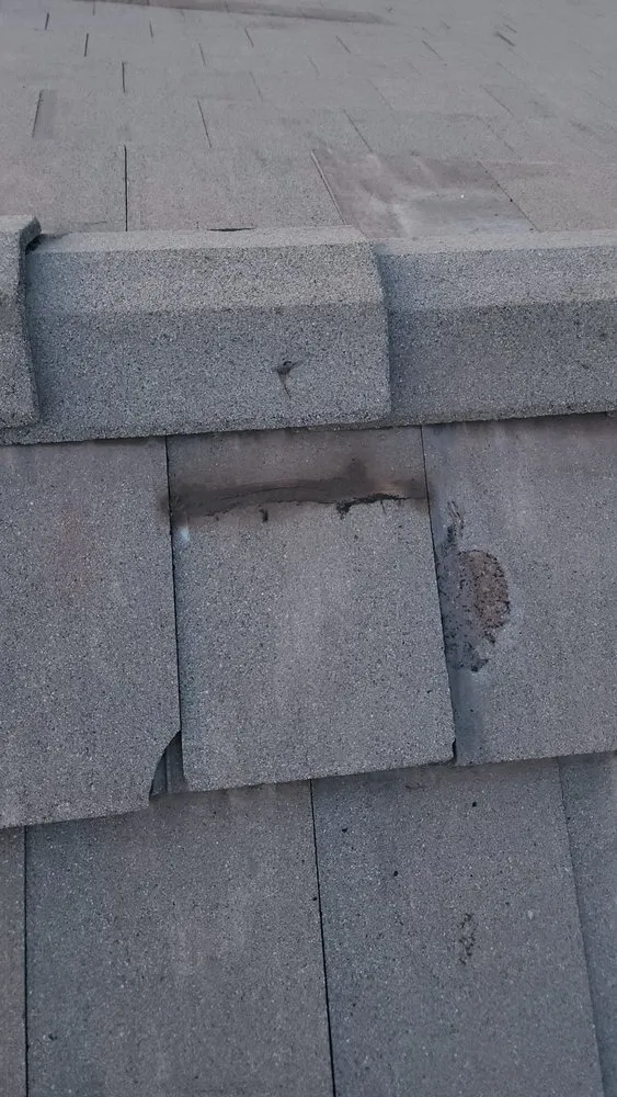 Slide of Rescue Roofing Construction