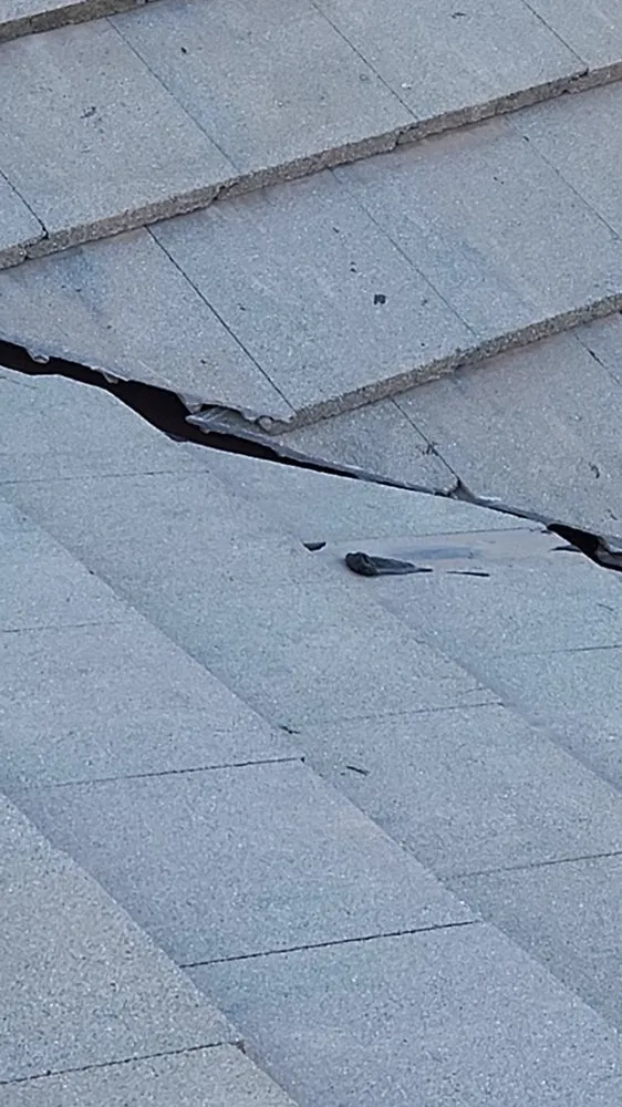 Slide of Rescue Roofing Construction