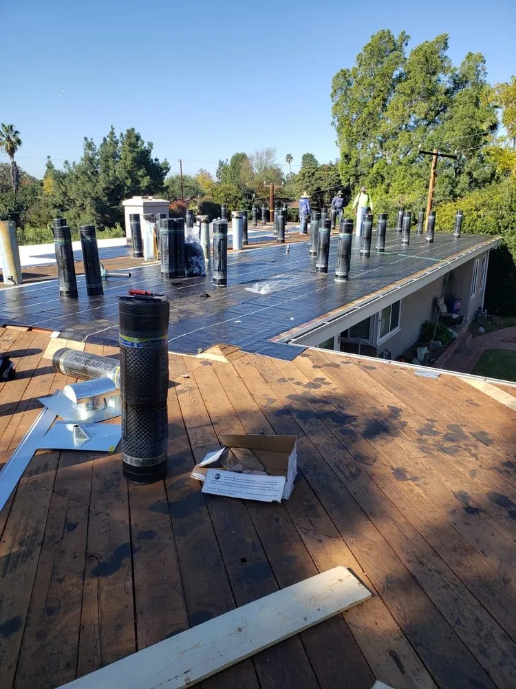 Slide of Rescue Roofing Construction