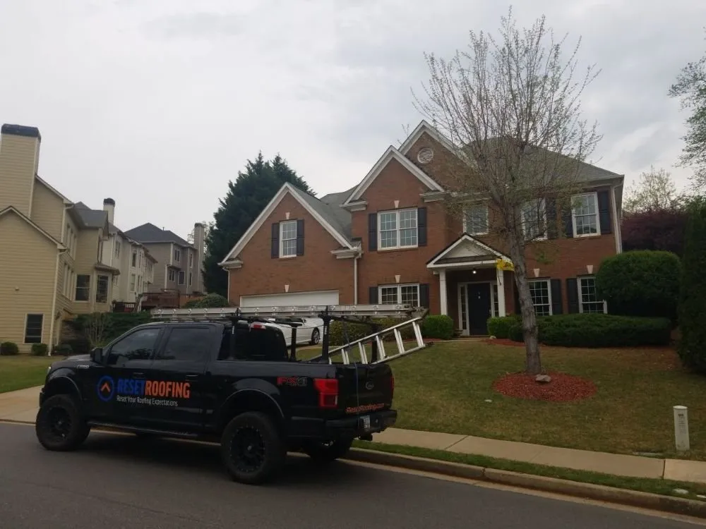 Slide of Reset Roofing