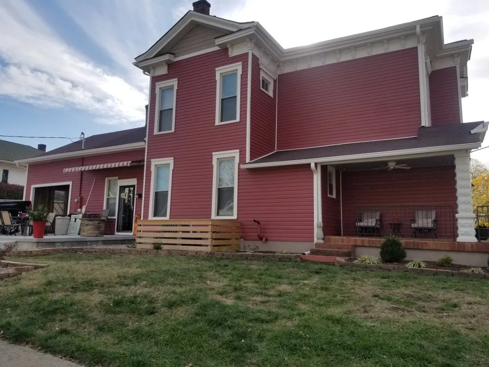 Slide of Residence Roofing & Restoration