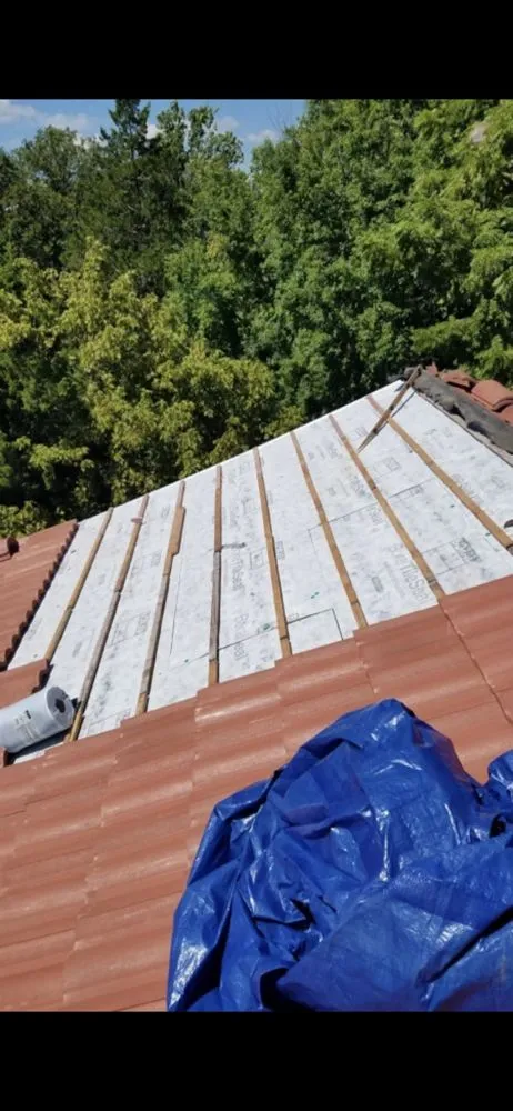 Slide of Reston Gutters