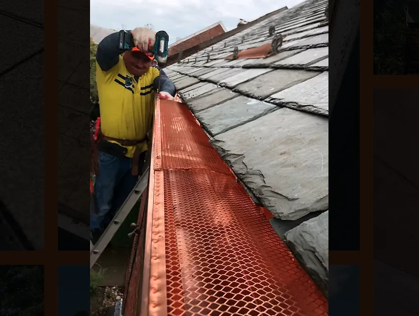 Slide of Reston Gutters