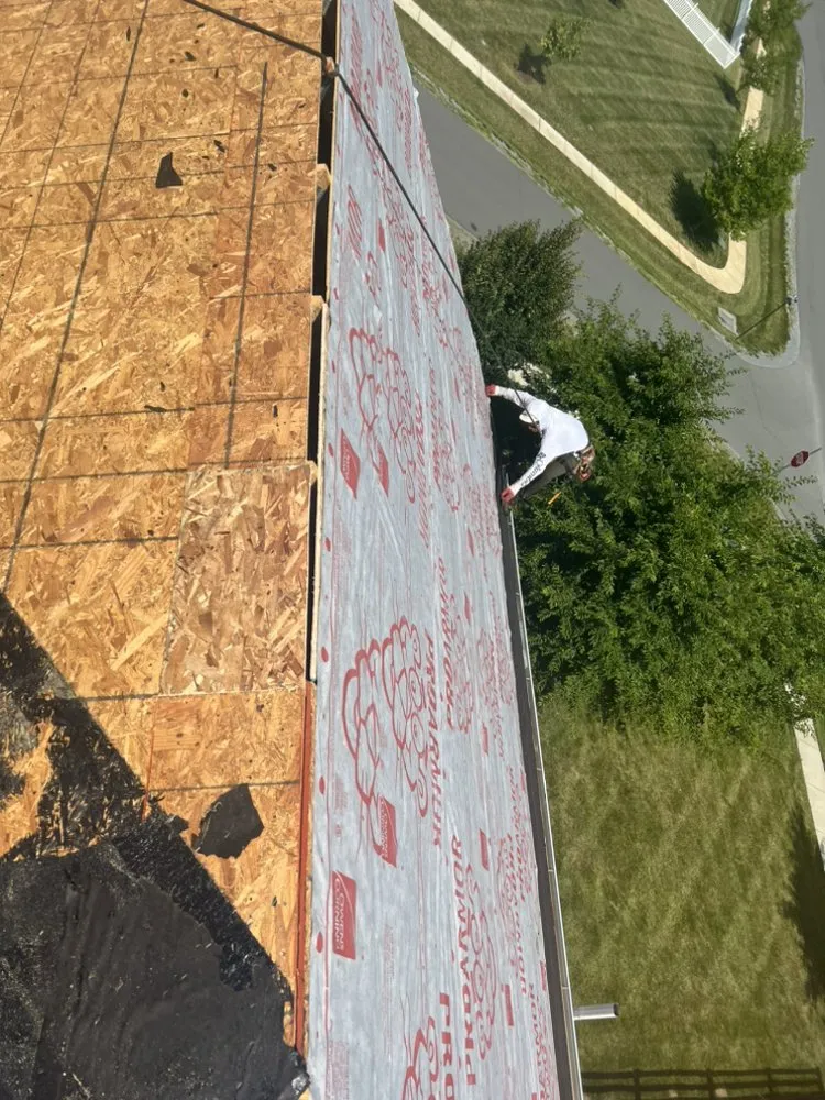 Slide of Reston Gutters