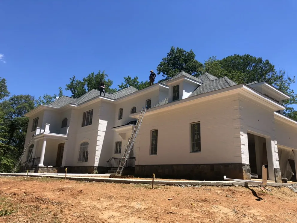 Slide of Reston Gutters