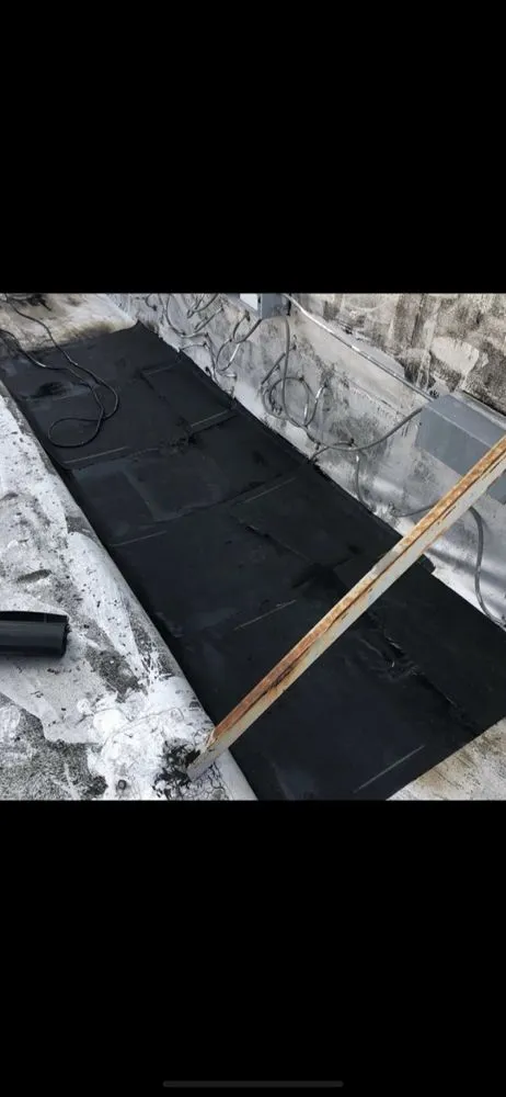 Slide of Restoration Roofing Masonary