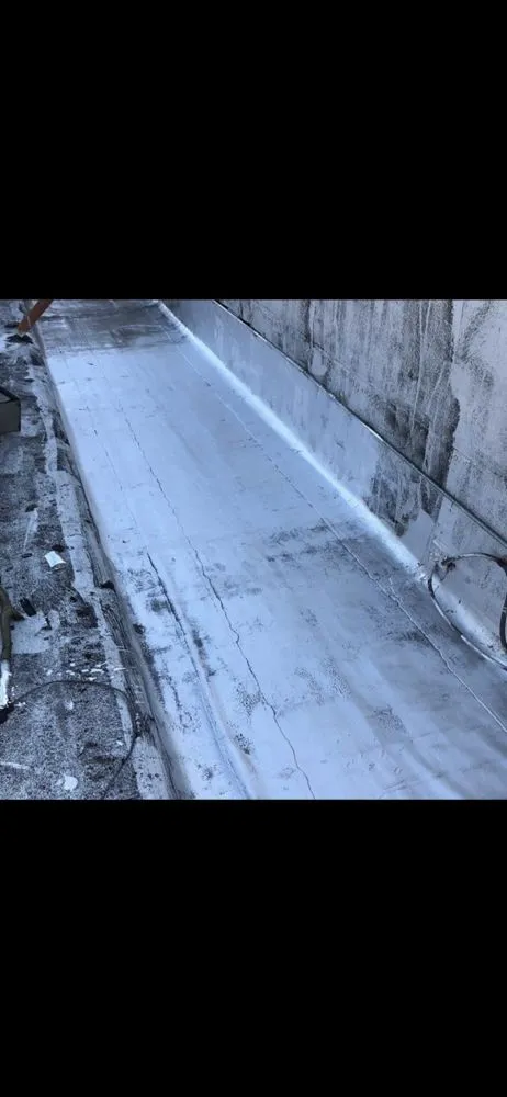 Slide of Restoration Roofing Masonary