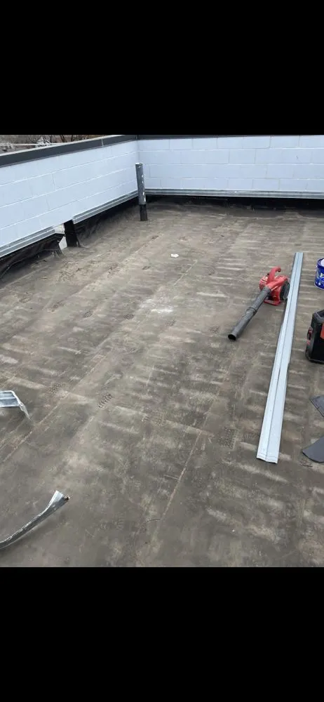 Slide of Restoration Roofing Masonary