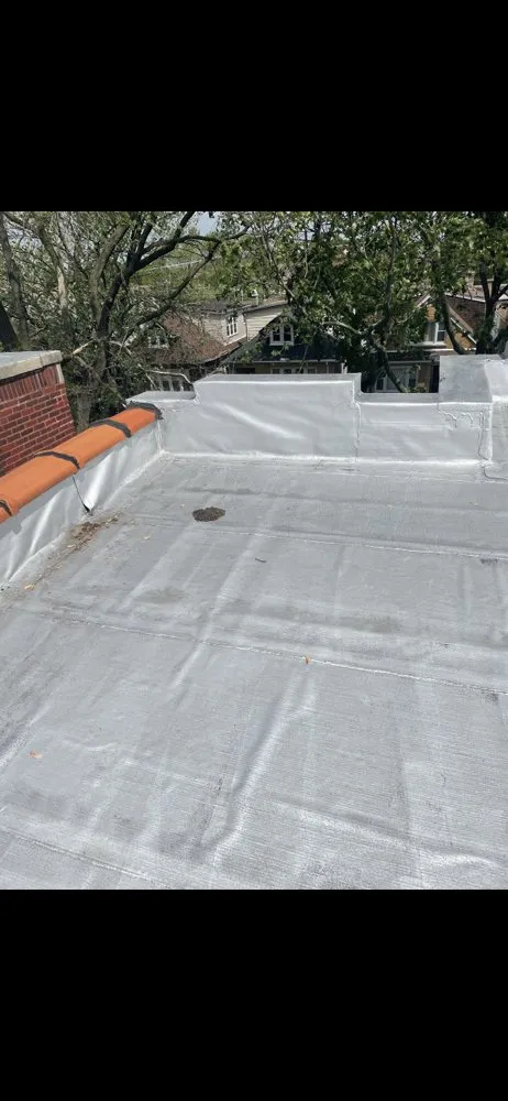 Slide of Restoration Roofing Masonary