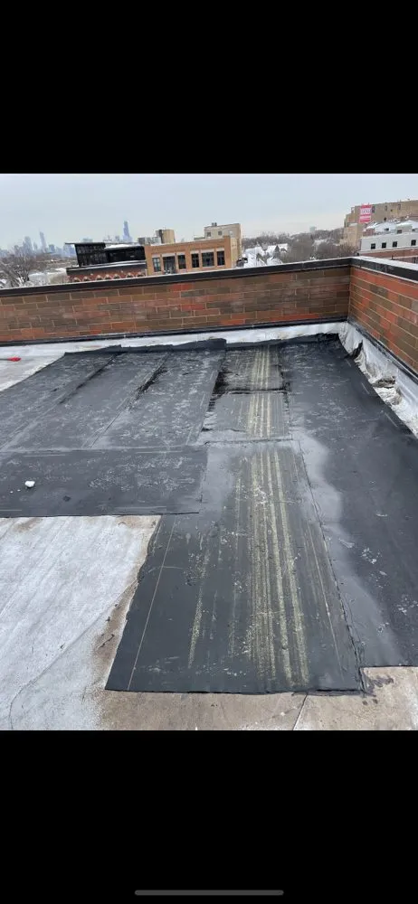 Slide of Restoration Roofing Masonary