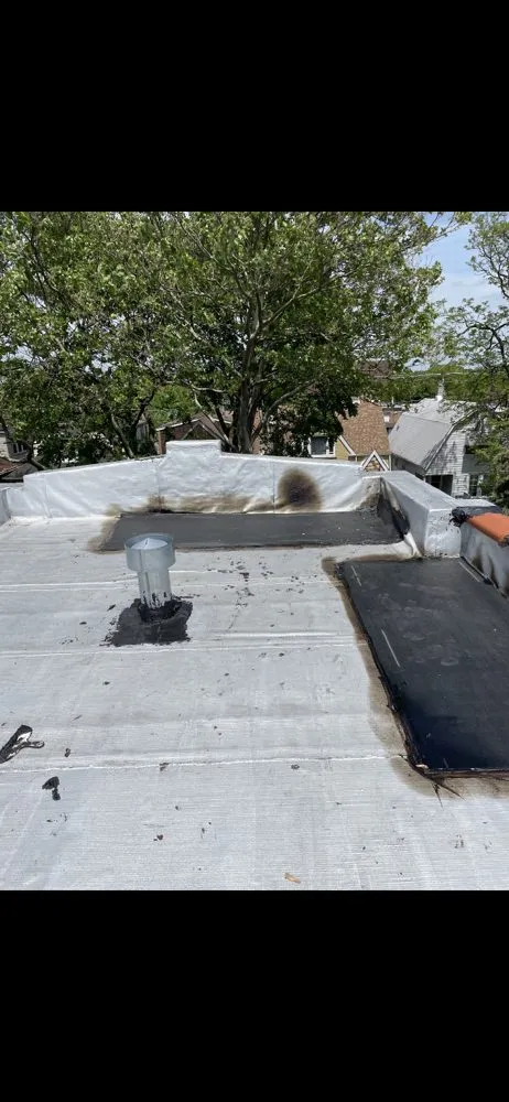 Slide of Restoration Roofing Masonary