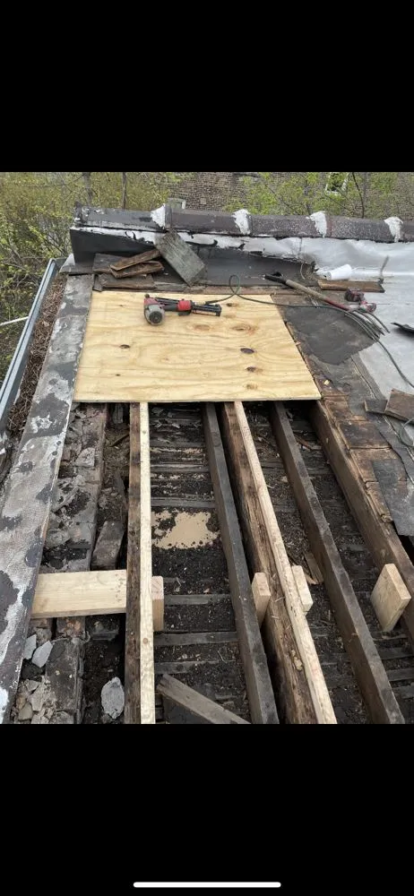 Slide of Restoration Roofing Masonary