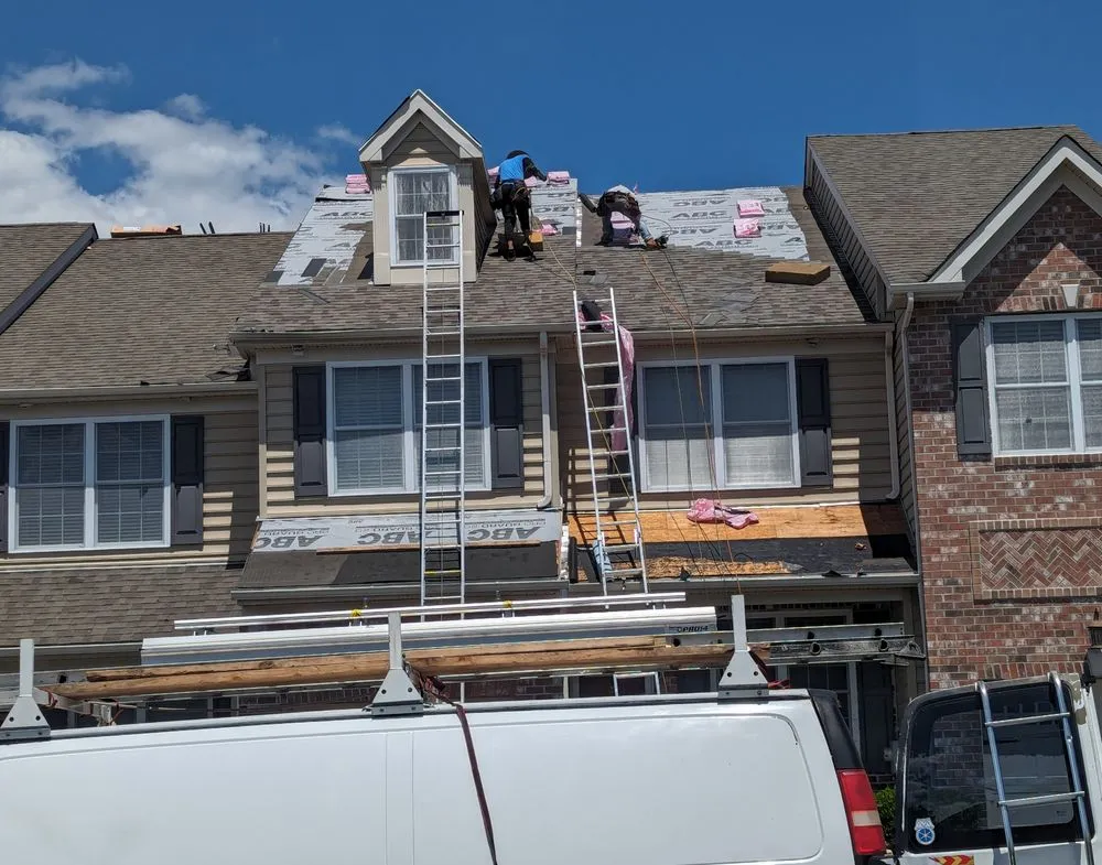 Slide of Restore Roofing