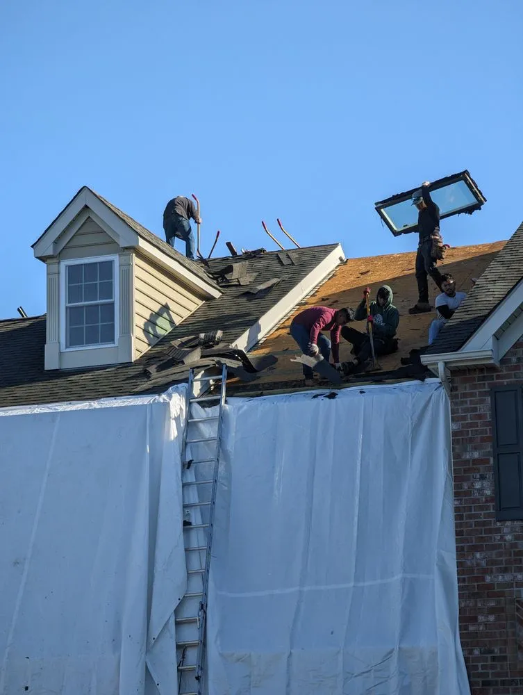 Slide of Restore Roofing