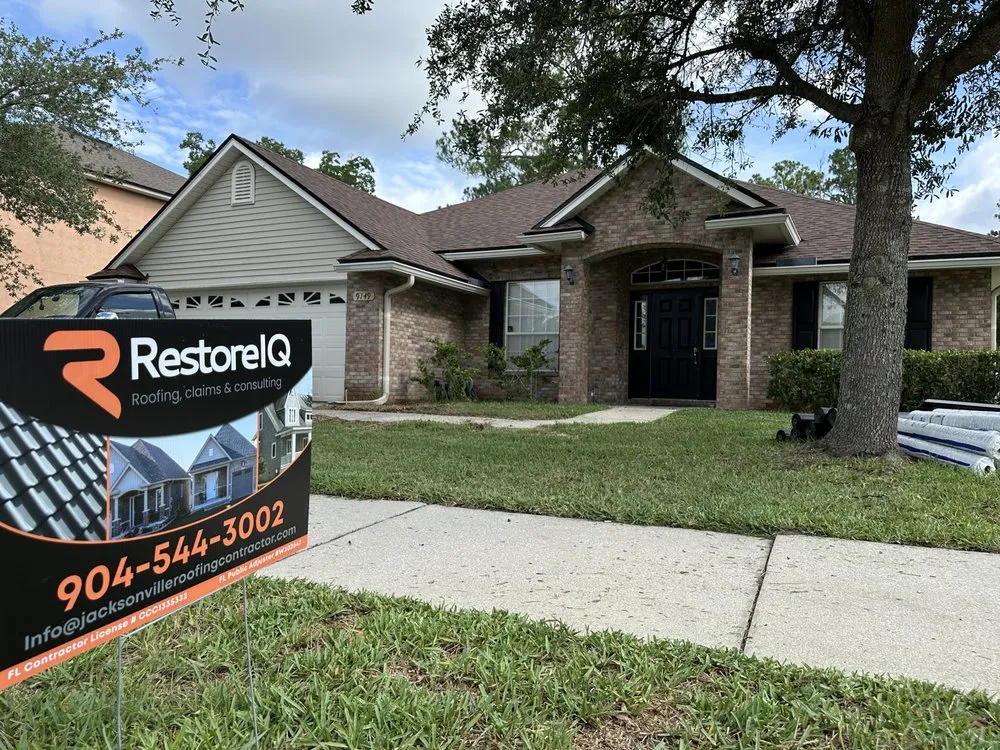 Slide of RestoreIQ Roofing And Construction