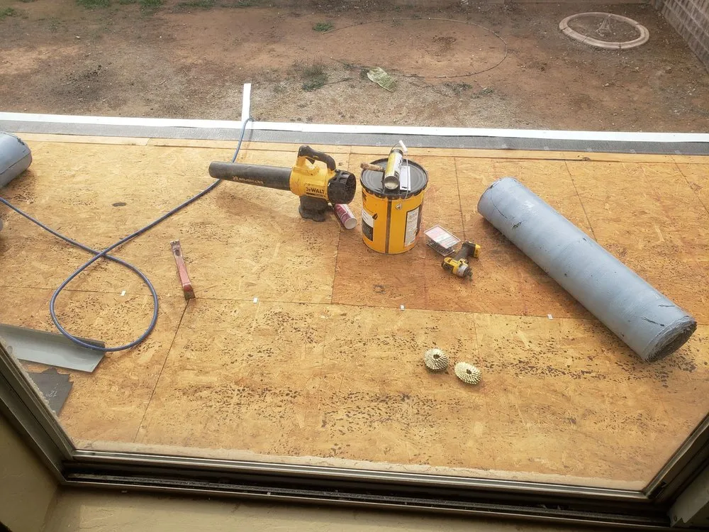 Slide of Revamp Roofing