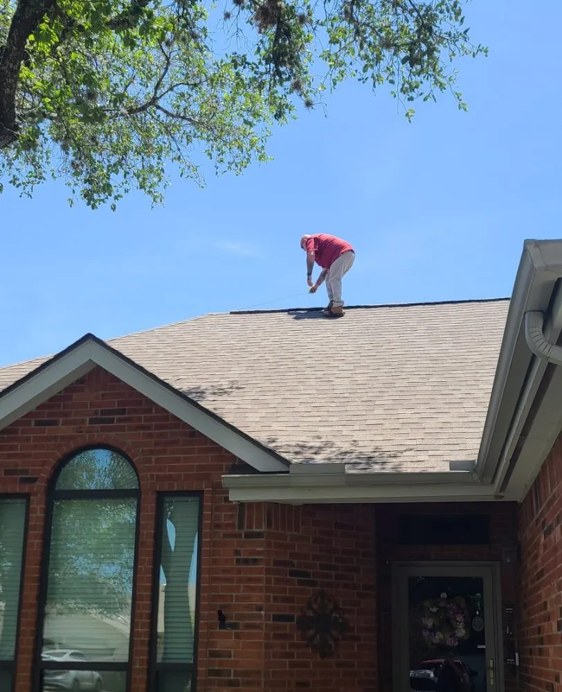 Slide of Reveille Roofing