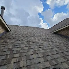 Slide of Reveille Roofing