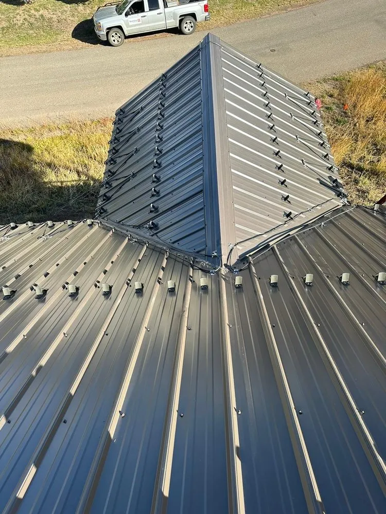 Slide of Revelation Roofing