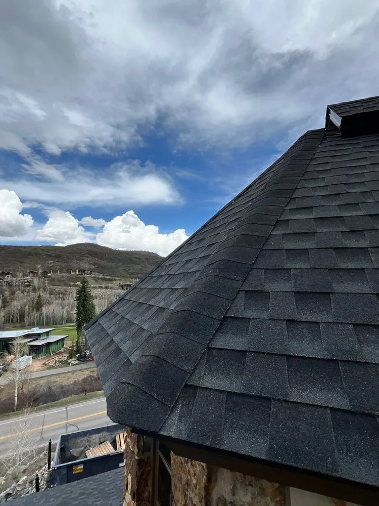 Slide of Revelation Roofing