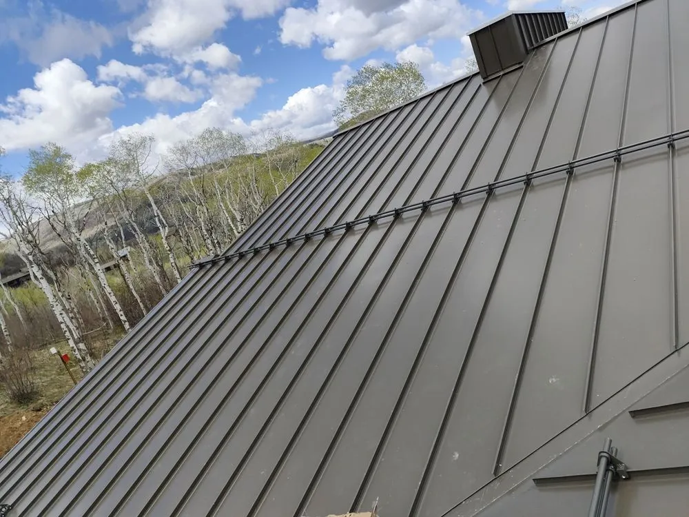 Slide of Revelation Roofing