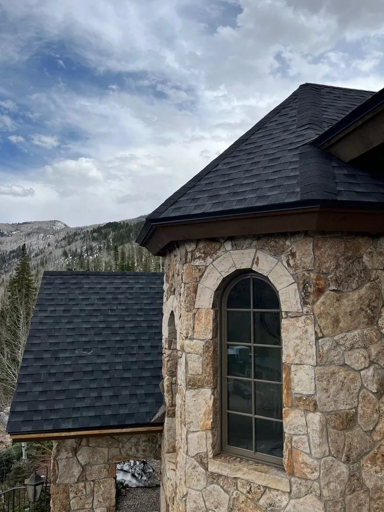 Slide of Revelation Roofing