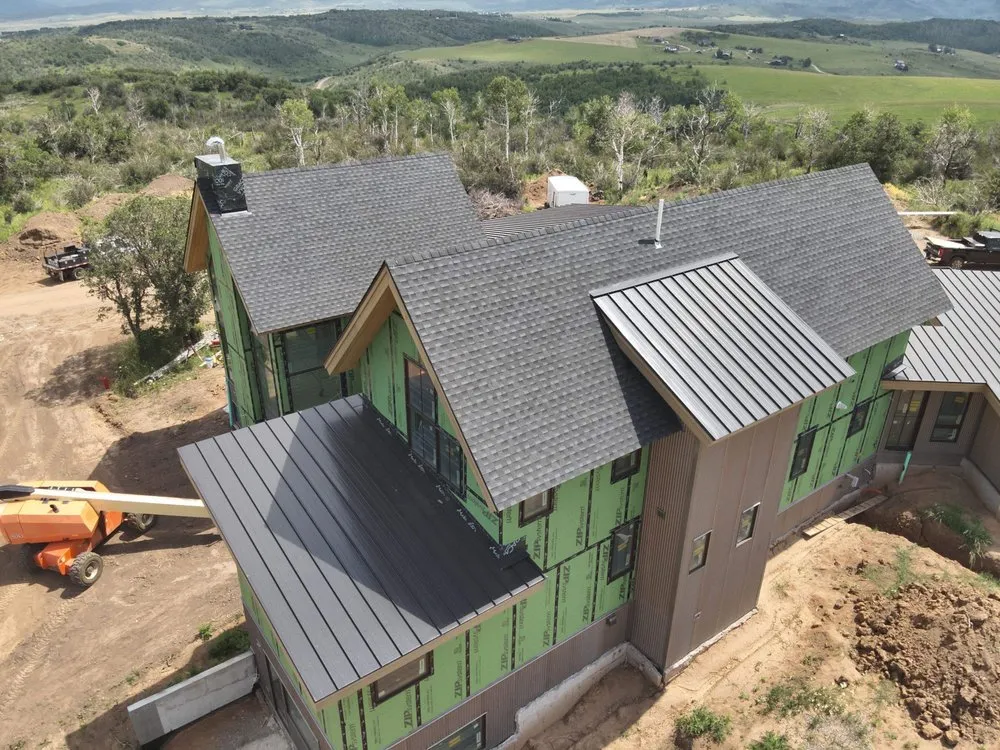 Slide of Revelation Roofing