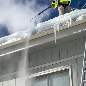 Slide of Revelation Roofing