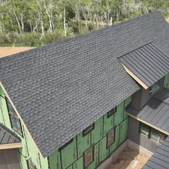 Slide of Revelation Roofing