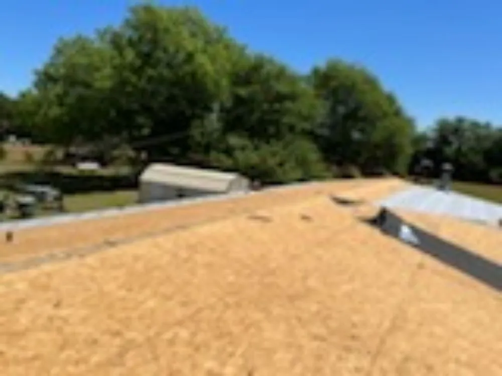 Slide of Revelation Roofing