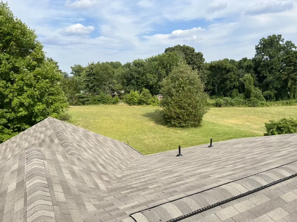 Slide of Revelation Roofing